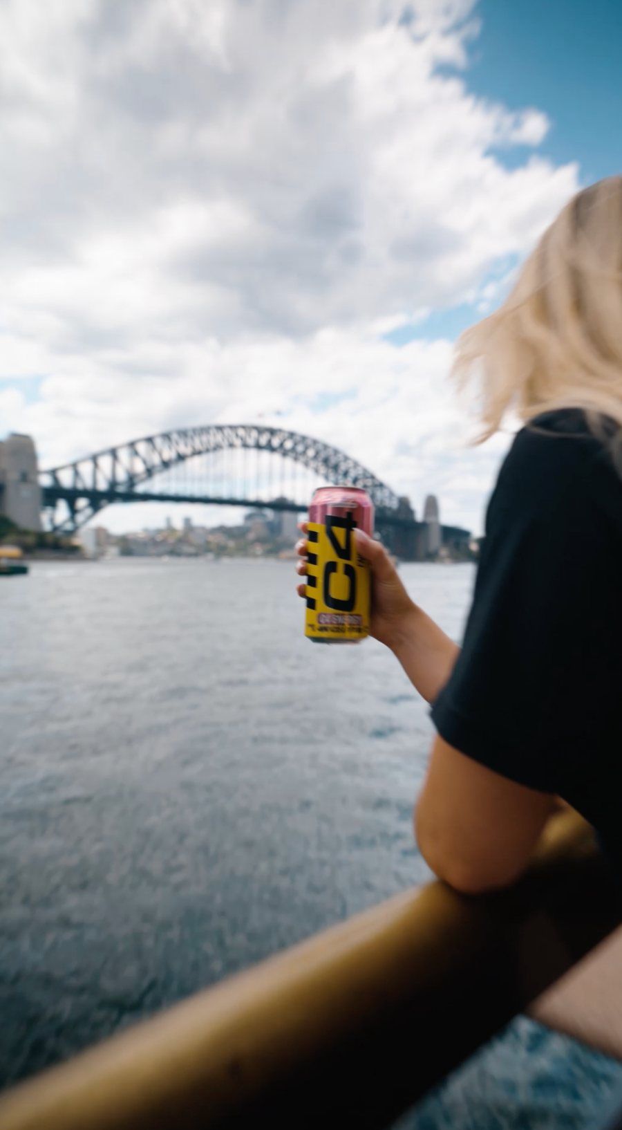 C4 Energy social video: a can held up against Sydney Harbour Bridge